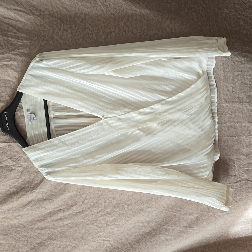 H&M silk like faux wrap blouse with front lining. Women's size 12